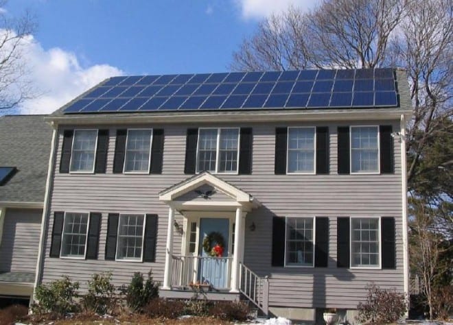 Solar panels installed on the rooftop of a suburban home