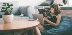 young woman reading in a beanbag chair