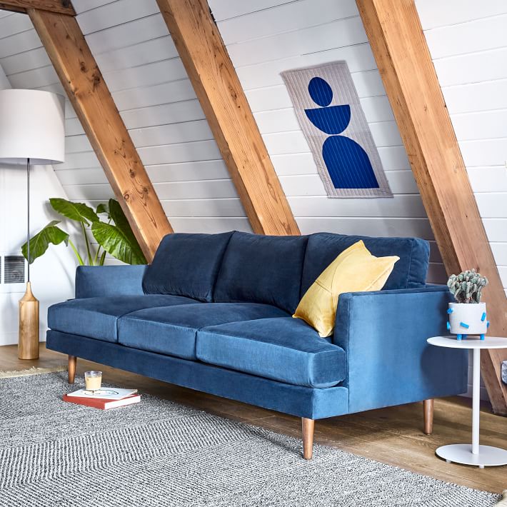 blue velvet sofa in the attic