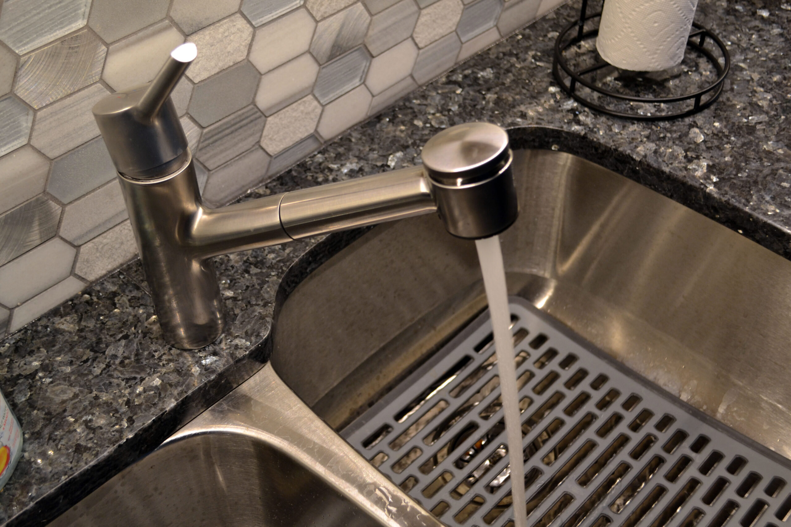 Stainless Steel Sink at Chicago Lake Shore Condo Transitional White Kitchen Remodeling Project